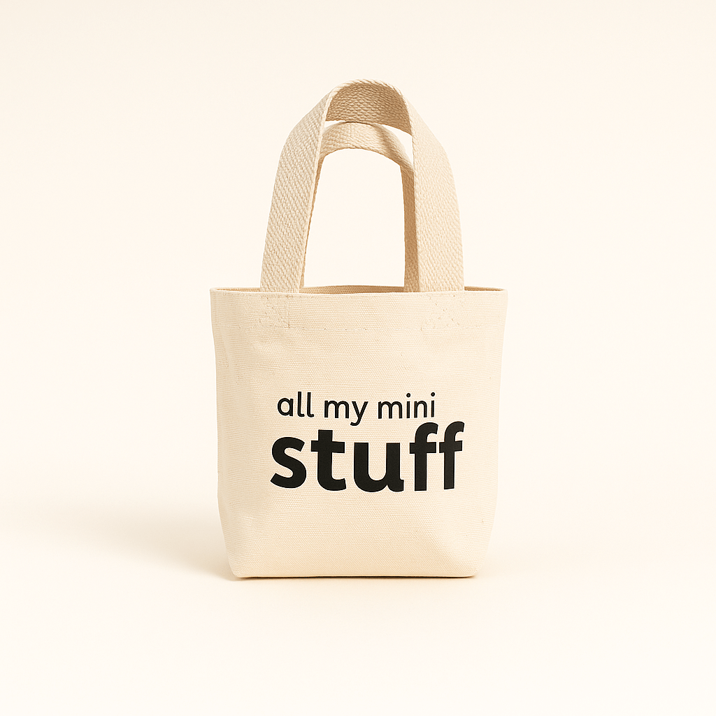 Natural tote bag with 'all my mini stuff' text on a beige background