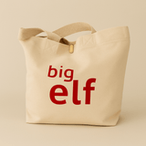 Natural tote bag with 'big elf' text in red on a beige background
