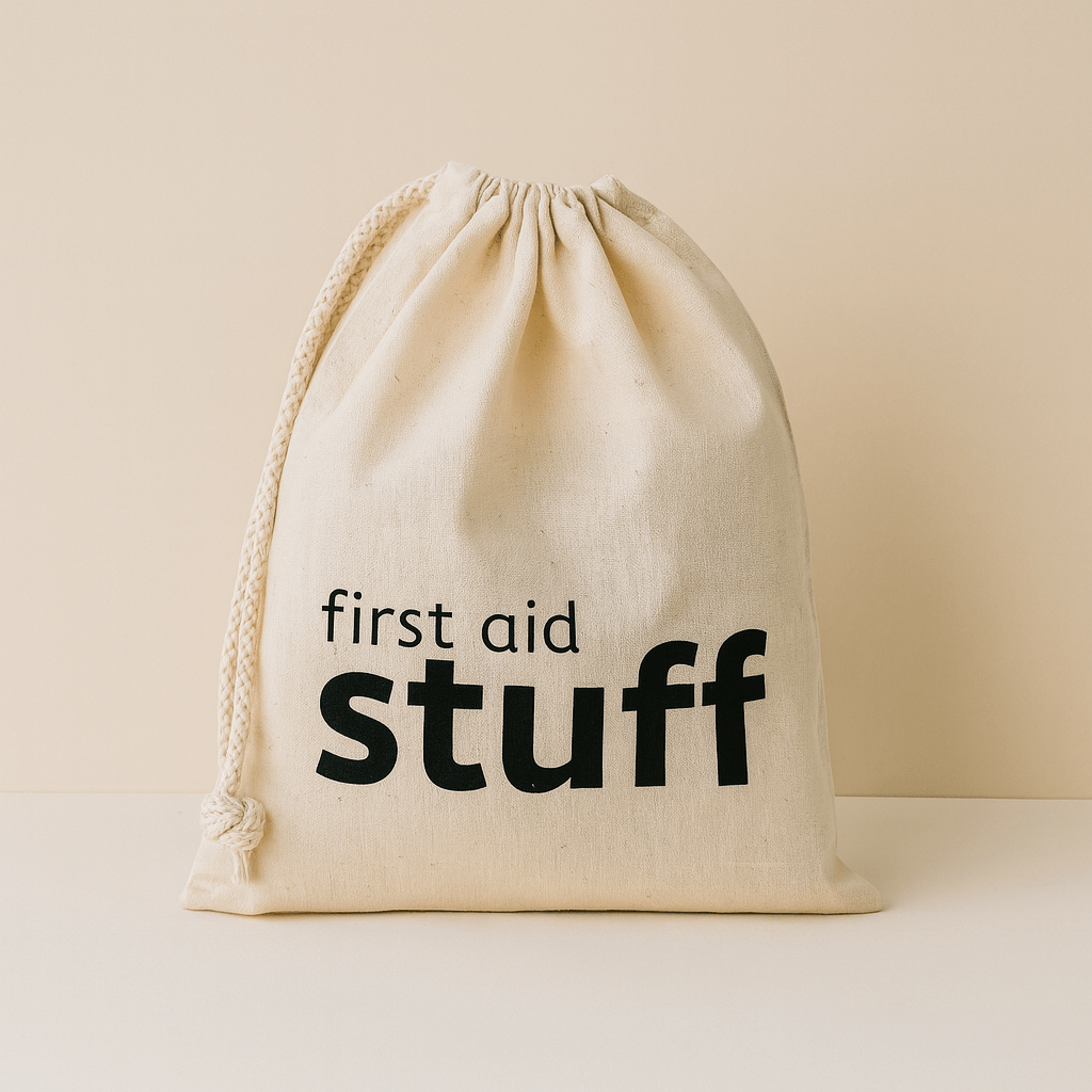 Natural 100% Cotton drawstring bag with 'first aid stuff' text on a beige background
