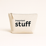 Natural pouch with 'important stuff' text on a beige background