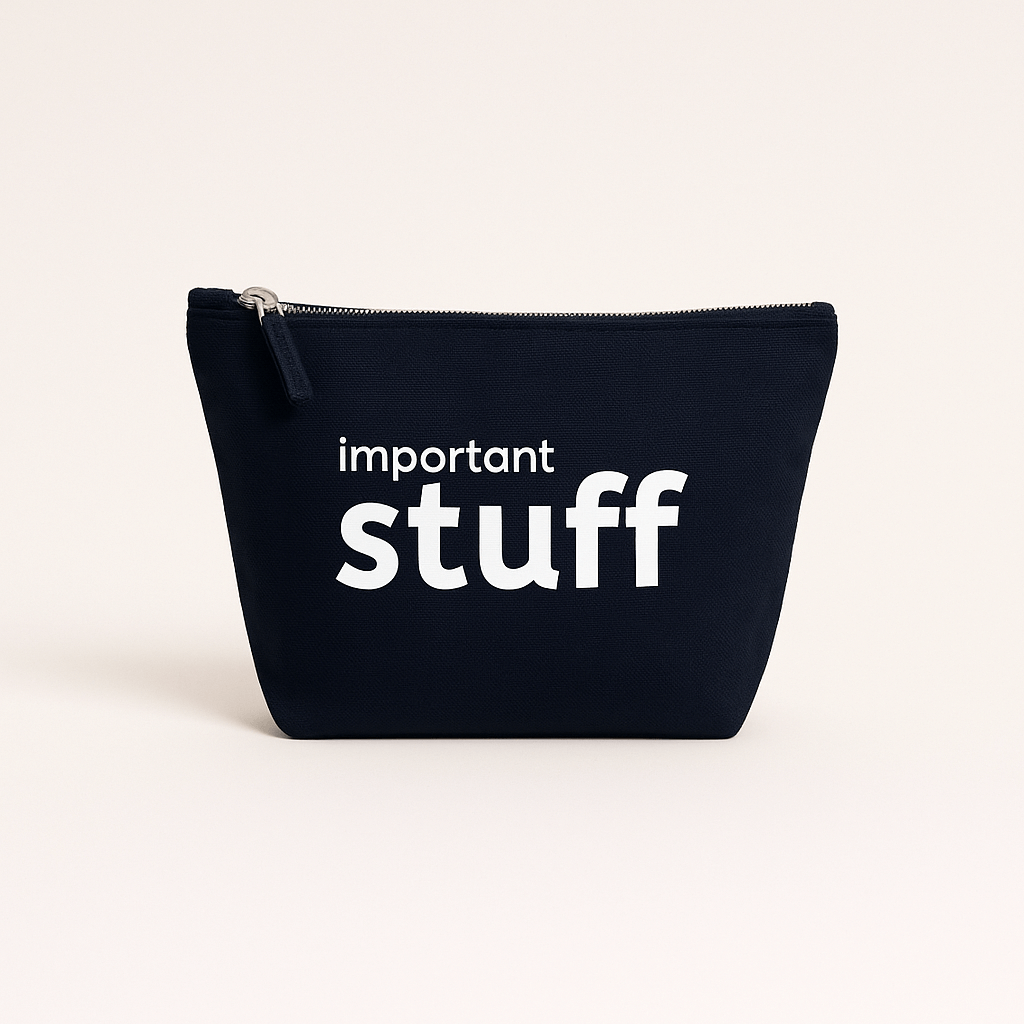 Navy pouch with 'important stuff' text on a beige background