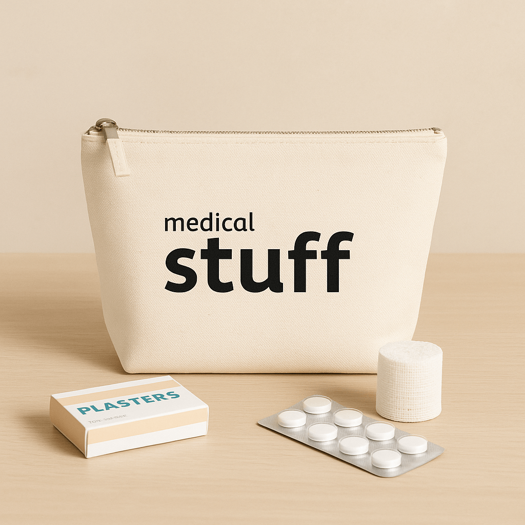 Natural pouch labeled 'medical stuff' with plasters, bandages, and other medical supplies on a beige background