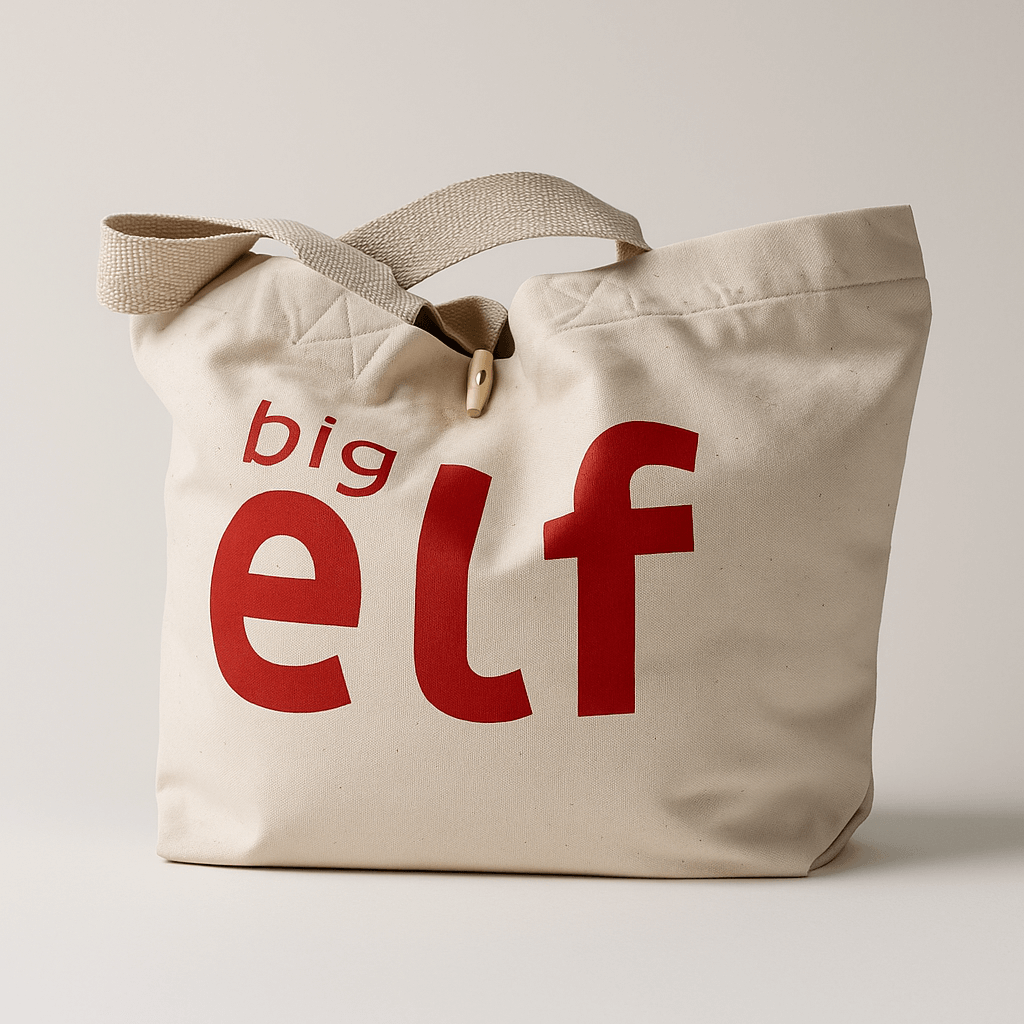 Natural tote bag with 'big elf' text in red on a light background