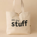 natural cotton canvas tote bag with 'all my stuff' text on a beige background
