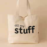 natural cotton canvas tote bag with 'all my stuff' text on a beige background