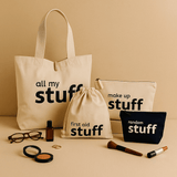 Collection of bags with text 'all my stuff', 'make up stuff', 'first aid stuff', and 'random stuff' on a beige background.