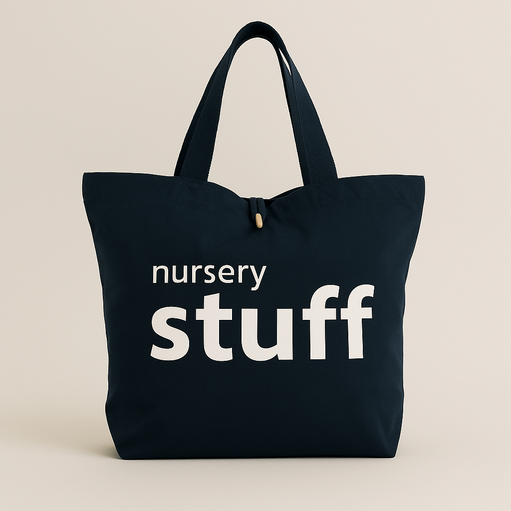 Navy tote bag with 'nursery stuff' text on a beige background