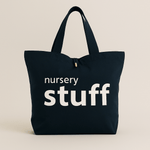 Navy tote bag with 'nursery stuff' text on a beige background